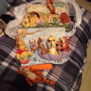 A cardboard barrel of winnie the pooh stuff